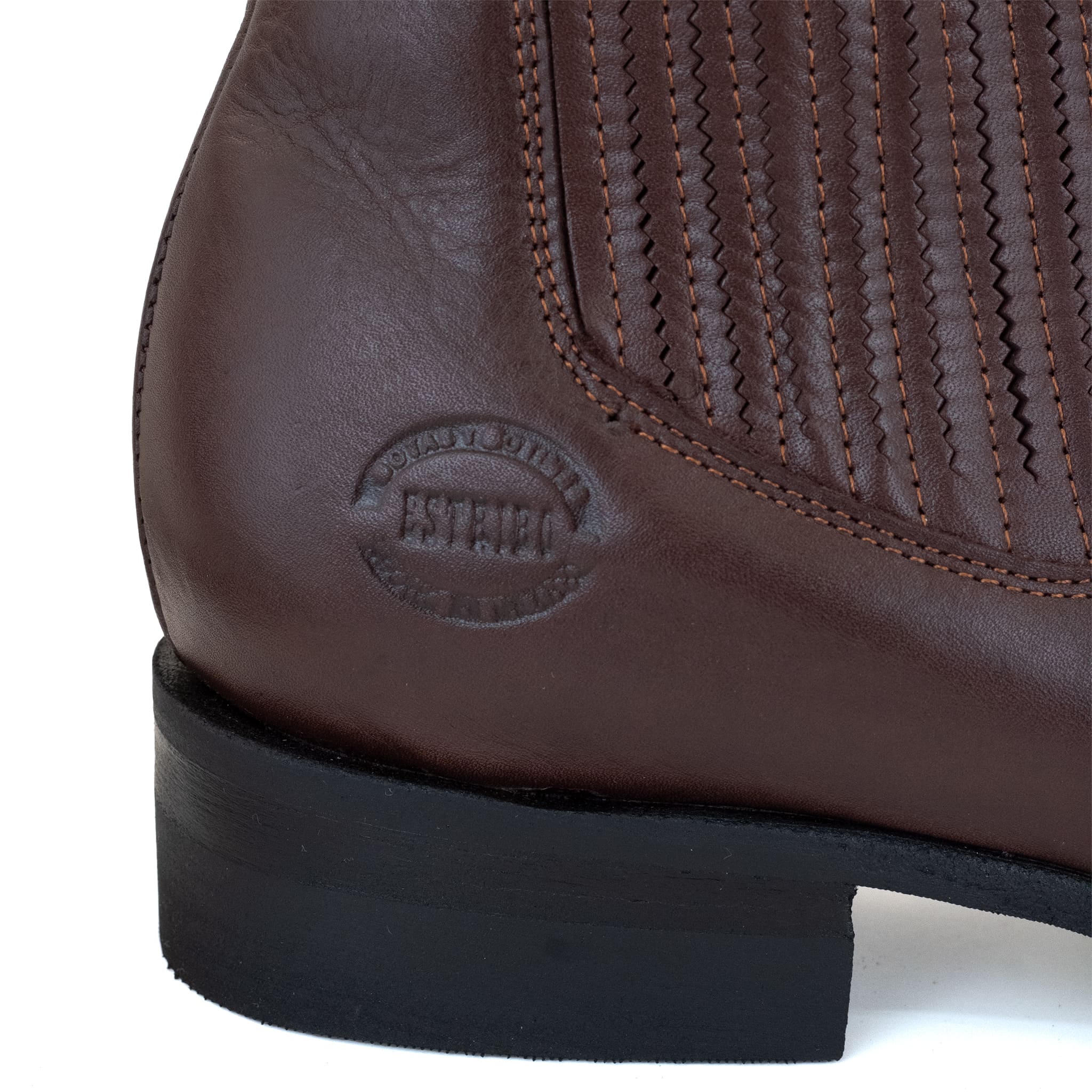 BOTIN ESTRIBO CHARRO SUELA DE HULE VINO