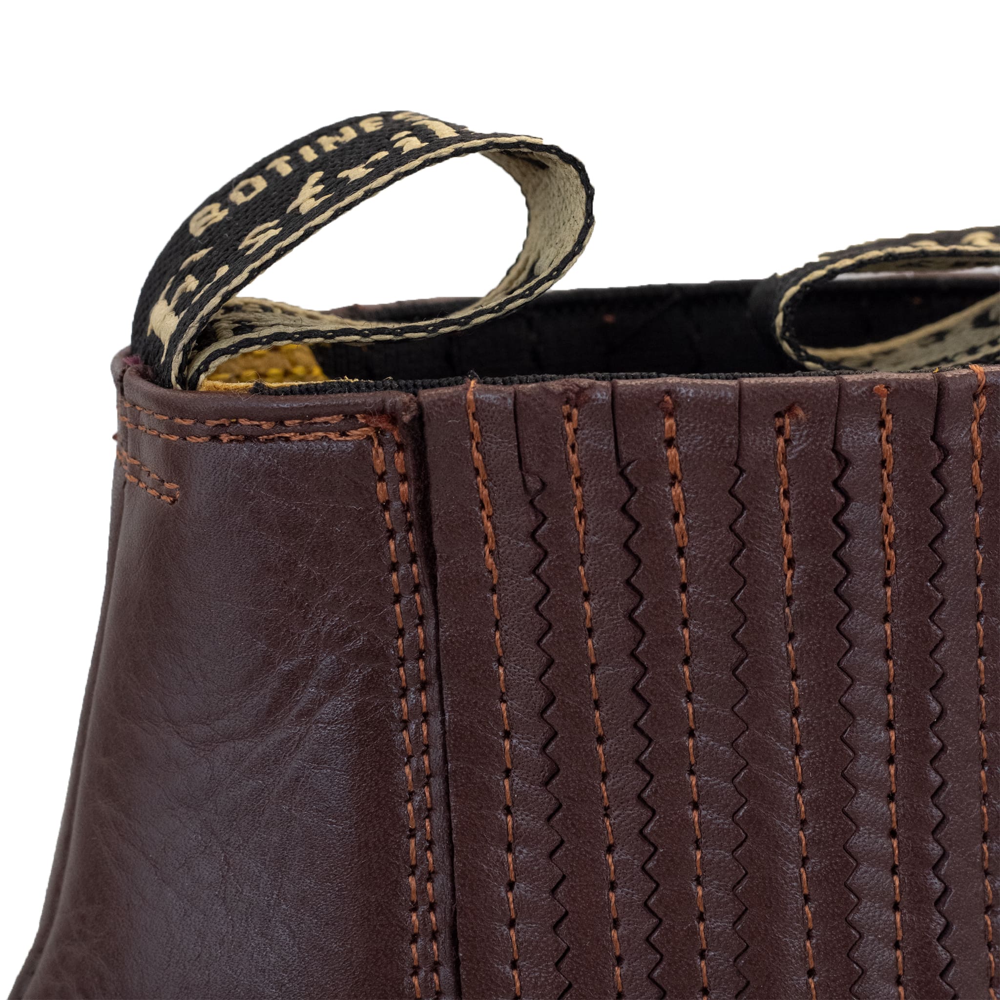 BOTIN ESTRIBO CHARRO SUELA DE HULE VINO